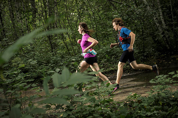 Trail runners training stock photo