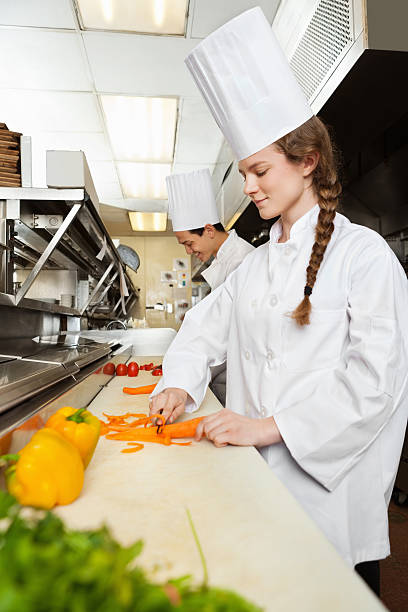 istock Chefs preparing food in a commercial restaurant kitchen 171377954