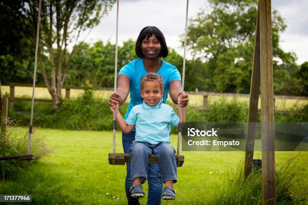 Mother And Son At Playpark Stock Photo - Download Image Now - 2-3 Years, Adult, Affectionate