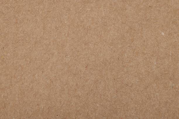 istock Texture of brown paper sheet as background, top view 1713780585