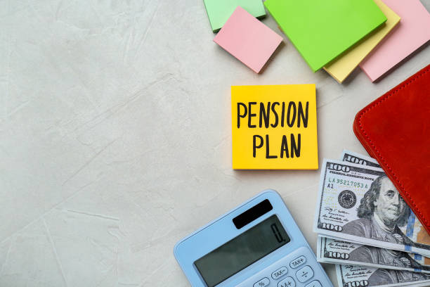 istock Note with words Pension Plan, banknotes and calculator on white office table, flat lay. Space for text 1713780626