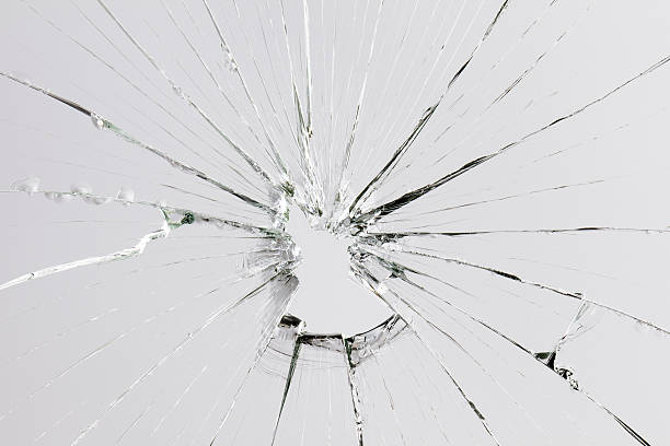 割れガラス - bullet hole glass cracked hole ストックフォトと画像
