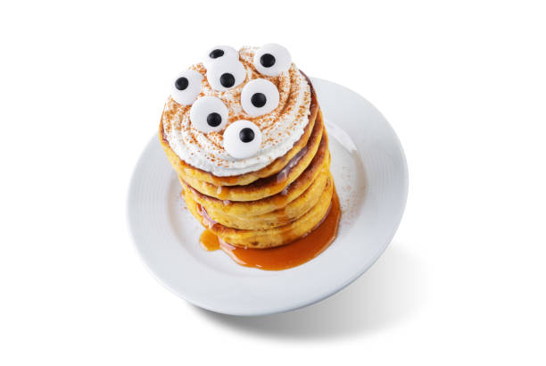 istock Pumpkin pancakes for Halloween holidays on a white isolated background 1713781139