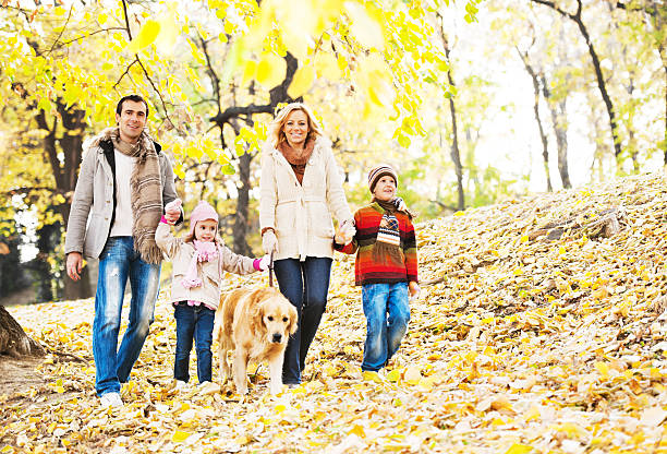 istock Cheerful family walking in park. 171378544