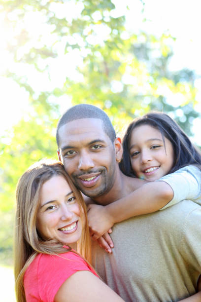 istock Interracial young family outdoors taking a picture 171378844