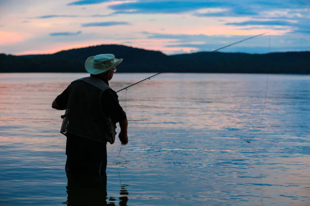 istock Fisherman Silhouette at Sunset 171378869