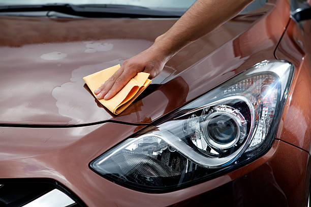 istock man polishing car hood 171379047