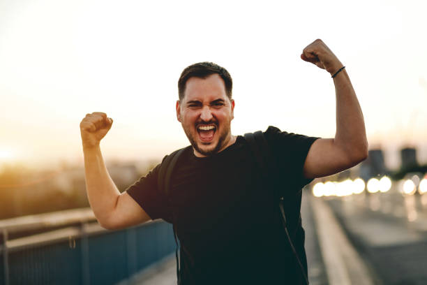 istock happy man walks across the bridge 1713796333