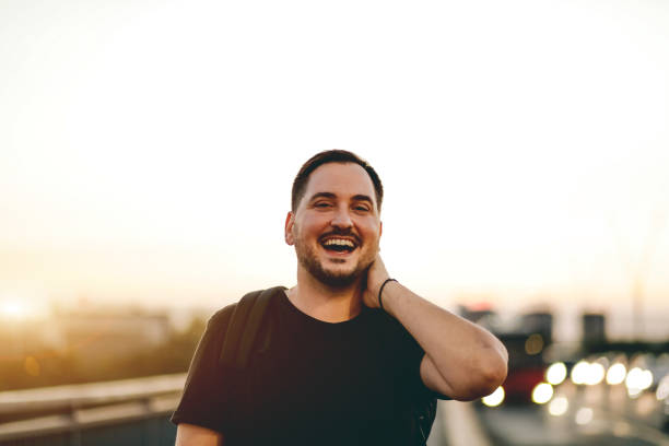 istock happy man walks across the bridge 1713796862