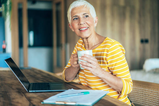 istock Senior woman at Home office 1713797400