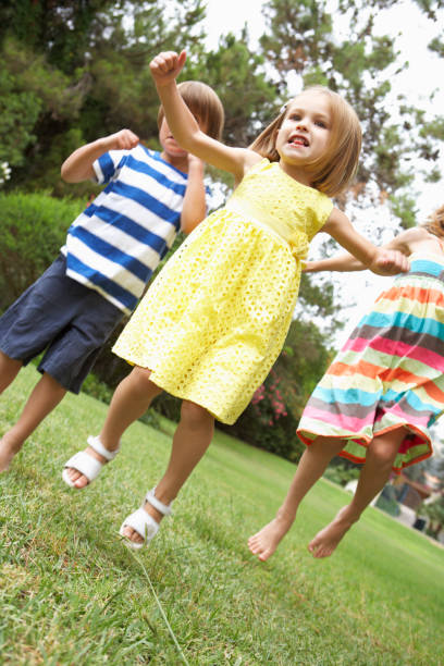 istock Group Of Children Playing Outdoors Together 171380008