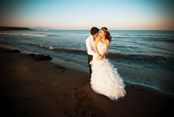 istock Newlywed couple on the coastline 171380033