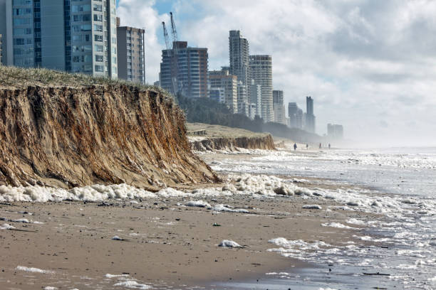 Severe weather causes beach erosion after storm activity stock photo