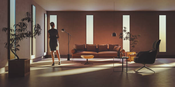 istock Lonely woman in living room 1713802805