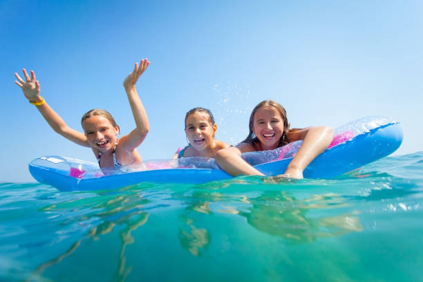 istock Children in the Sea lying on a  inflatable beach mattress 171380302