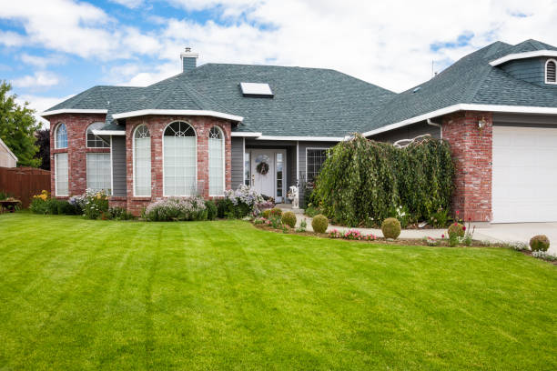 istock New Upscale Brick Home with Lawn 171381035