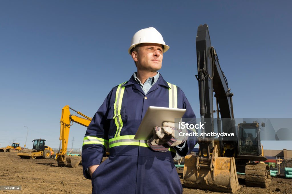 Construcción y PC - Foto de stock de Tableta digital libre de derechos