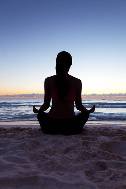 istock Yoga on the beach 171381178