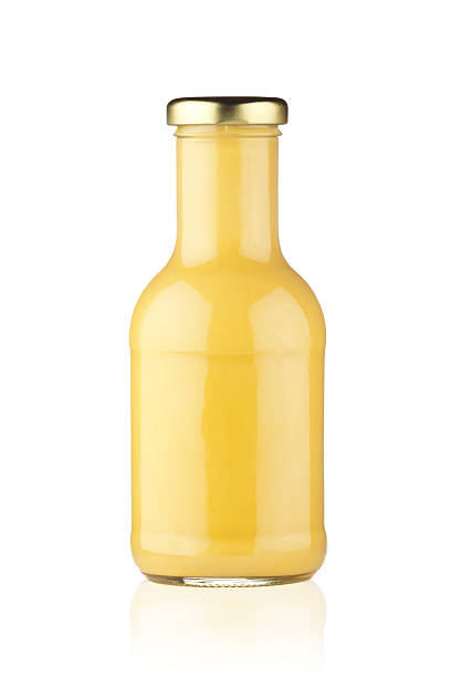 Mustard Salad Dressing Mustard Salad Dressing Bottle Isolated on White Background bottle of salad dressing stock pictures, royalty-free photos & images