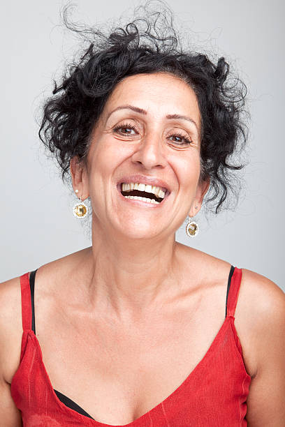 istock Mid adult woman making a smiling expression 171381525