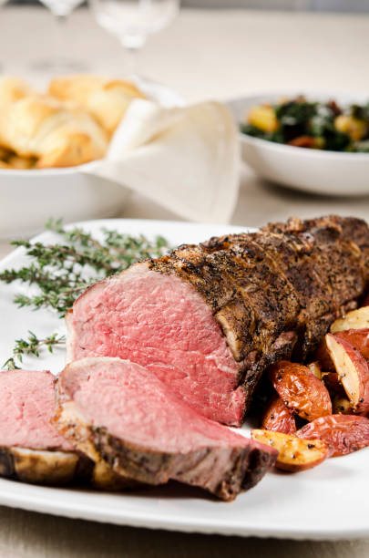 istock Roasted tenderloin served with potatoes in white plate 171382061