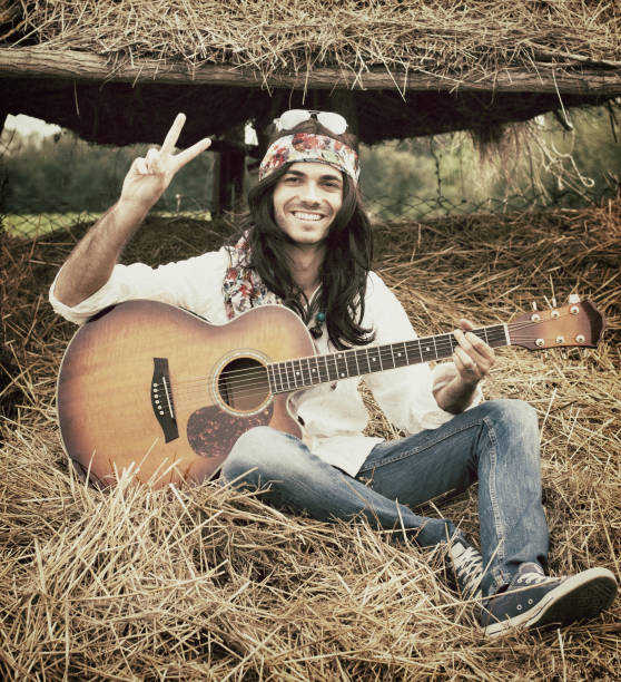 istock Hippie showing peace gesture. 1970s style. 171382064
