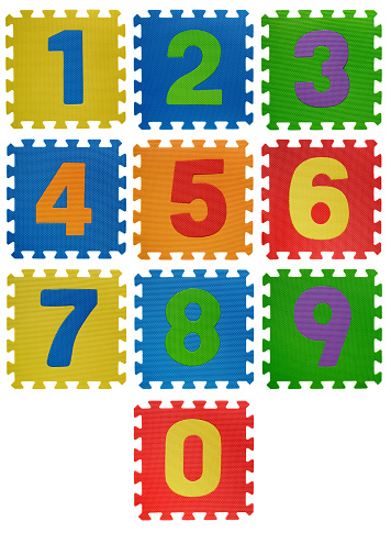 Multi colored number puzzles isolated on white. High resolution - 86 Mpx.