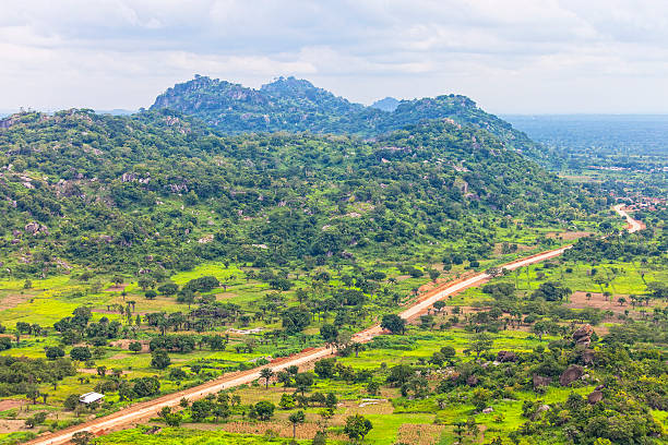 African landscape. Aerial view to West African landscape with hills and roads. benin stock pictures, royalty-free photos & images