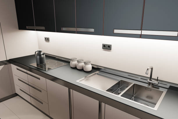 Luxury Black and beige Modern minimalist kitchen on two walls. Dark and beige materials. stock photo