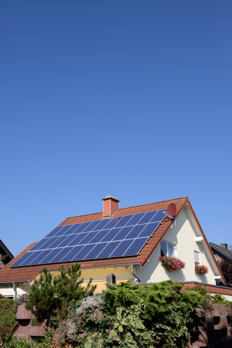 Solar panels on the roof of a single family house in summer. (XXXL-File)