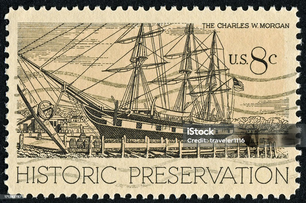 Charles W. Morgan Ship Stamp "Cancelled Stamp From The United States Commemorating The Historic Preservation Of The Charles W. Morgan, A Whaling Ship From 1841.  It Is The Oldest Merchant Ship Still In Existence." Ship Stock Photo