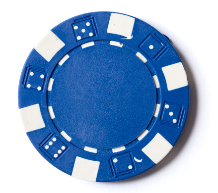 A picture of a poker chip on a white background.