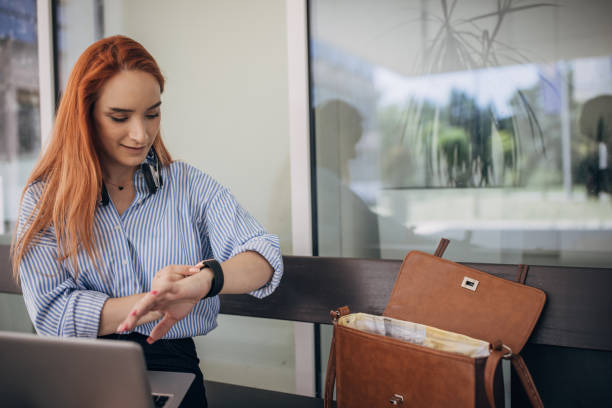 istock Modern businesswoman checking the time 1713830190
