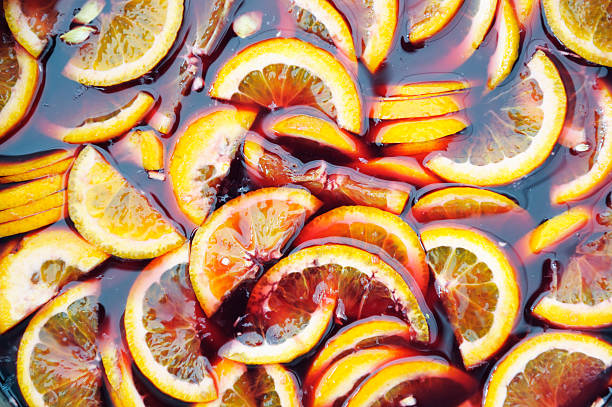 Sangria Fruit Cocktail Close-up of a sangria fruit cocktail. valencia orange stock pictures, royalty-free photos & images