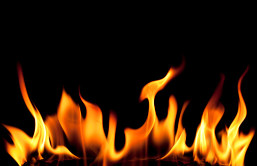 Fire background.  Blazing fire isolated on black background.