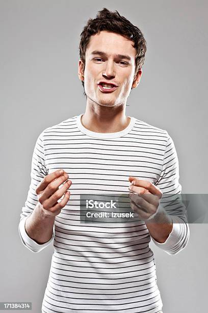 Man Talking At The Camera Stock Photo - Download Image Now - Talking, Discussion, Men