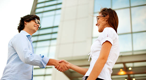 istock Businesspeople handshake outdoors. 171384364