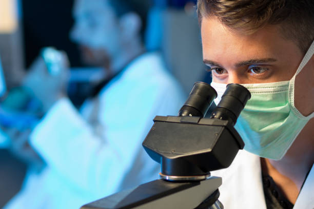 istock Researches keeping busy at a pharmaceutical lab 171384376