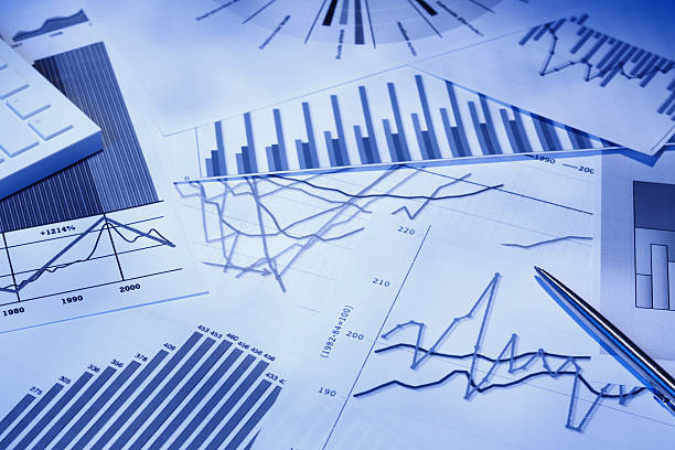 istock Various types of graphs and charts on white paper 171384566