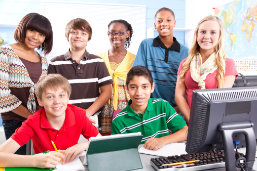 Teen students in computer lab.  