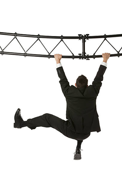 istock Businessman hanging from a metal structure 171385683