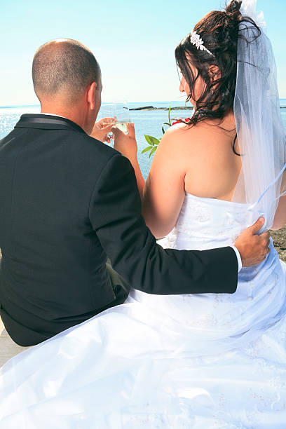 istock Wedding Couple - Back View Champagne Vertical 171385877