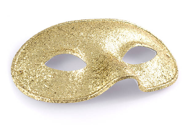 istock Golden glitter shiny face mask isolated on a white background 171386379