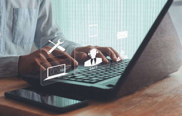 istock Technical Support Center Customer Service Business Technology Internet Concept. Businessman using laptop with support customer icon on virtual screen. IT support, Help desk, contact us, call center. 1713882744