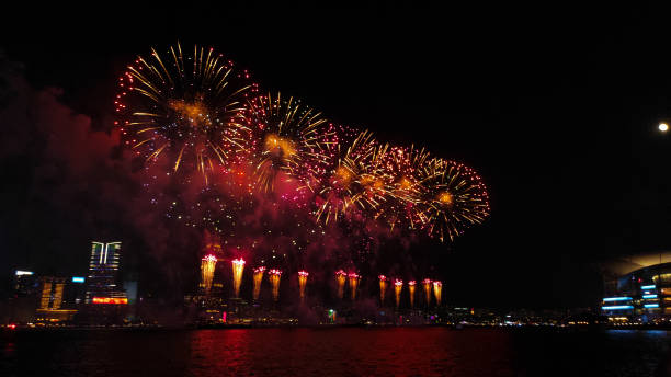 istock Fireworks display at Victoria harbour, Hong Kong 1713907762