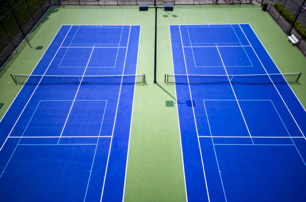 istock Blue pickleball tennis courts newly lined and painted 1713916478