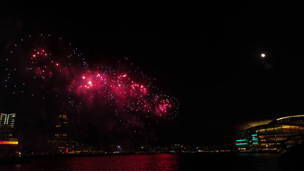 istock Fireworks display at Victoria harbour, Hong Kong 1713942803