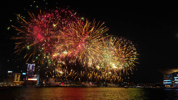 istock Fireworks display at Victoria harbour, Hong Kong 1713942805