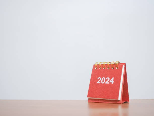 istock Close up 2024 desk calendar on the table with copy space. Resolution, Goal, Action, Planning, and manage to success business. 1713990480