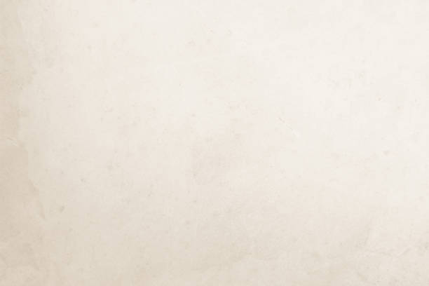 istock Colour old concrete wall texture background. Close Up retro plain cream color cement wall background texture. Design paper vintage parchment element show or advertise or promote product on display. 1714019187